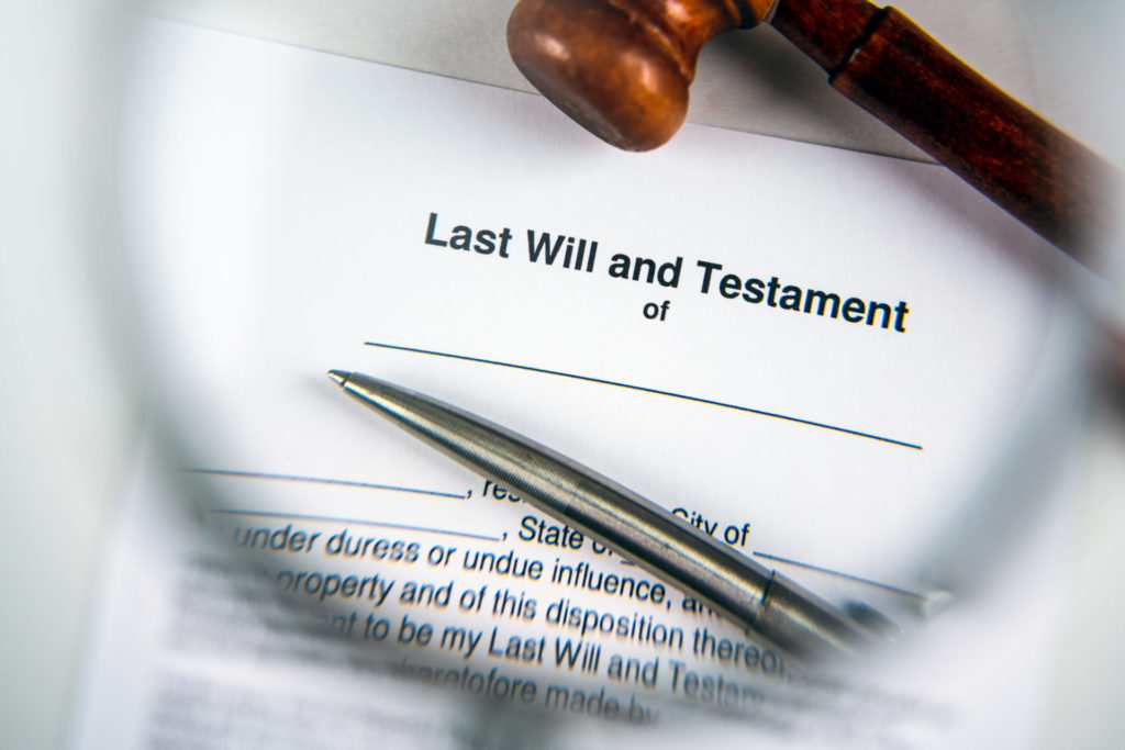 a magnifying glass zooming in on a will