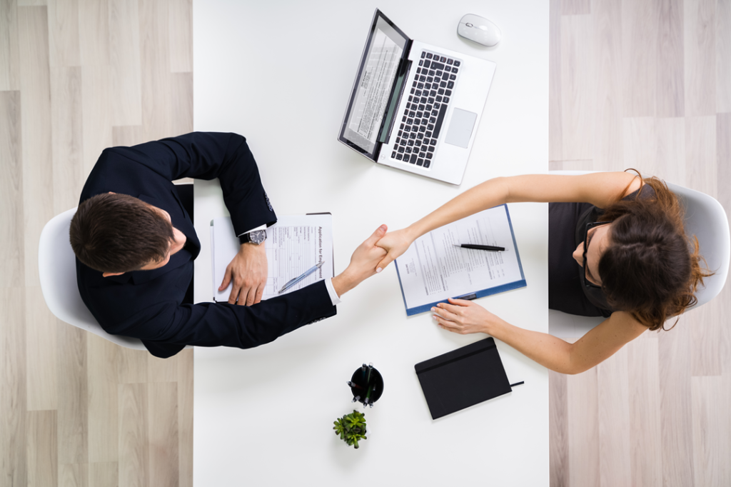 employment law two people shaking hands